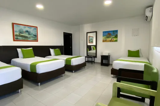 HABITACIÓN CUÁDRUPLE CON CAMAS INDIVIDUALES